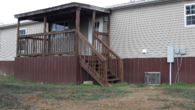 view of home's exterior featuring central air condition unit