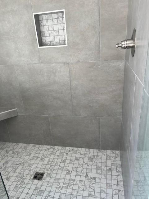 bathroom featuring walk in shower