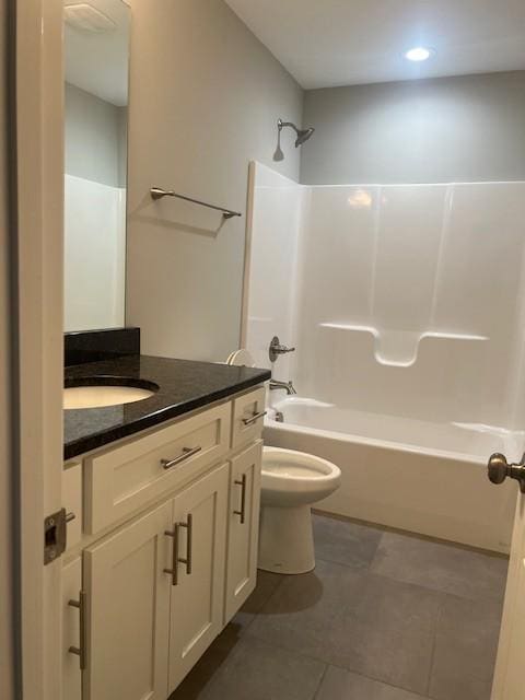 full bathroom with vanity, tile patterned floors, bathing tub / shower combination, and toilet