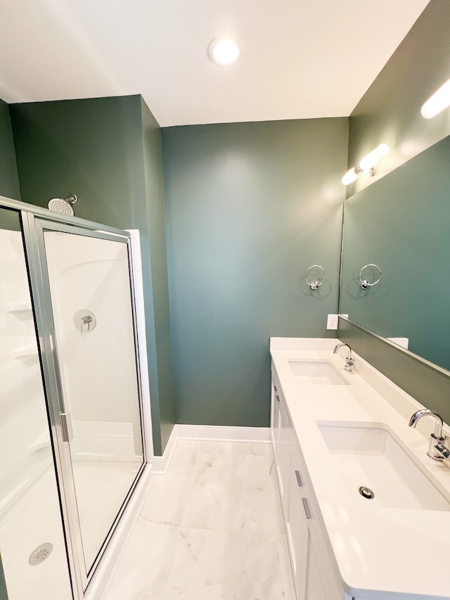 bathroom with walk in shower, tile patterned flooring, and dual bowl vanity