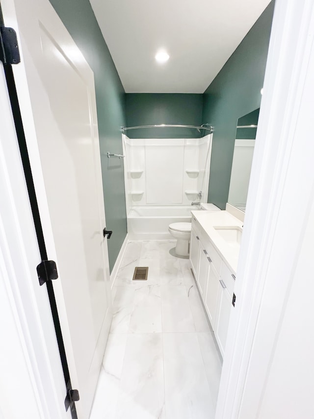 full bathroom featuring vanity, toilet, tile patterned floors, and shower / tub combination