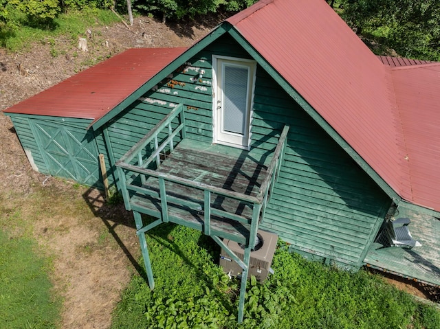 exterior space with metal roof