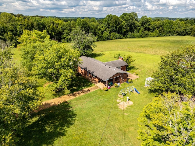 drone / aerial view with a rural view and a wooded view