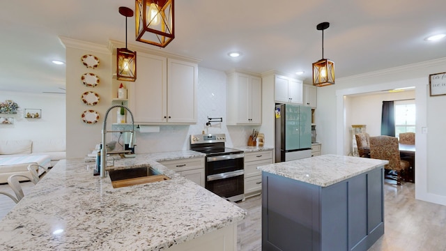 kitchen featuring light hardwood / wood-style flooring, stainless steel appliances, sink, pendant lighting, and light stone countertops