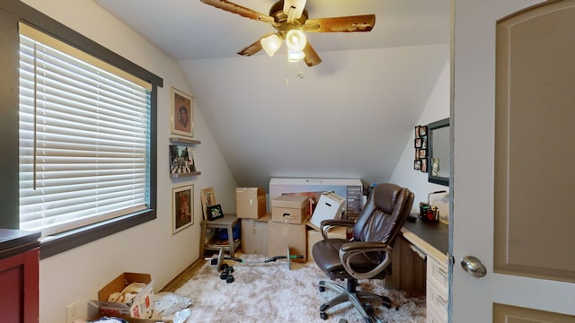 office area featuring ceiling fan and vaulted ceiling