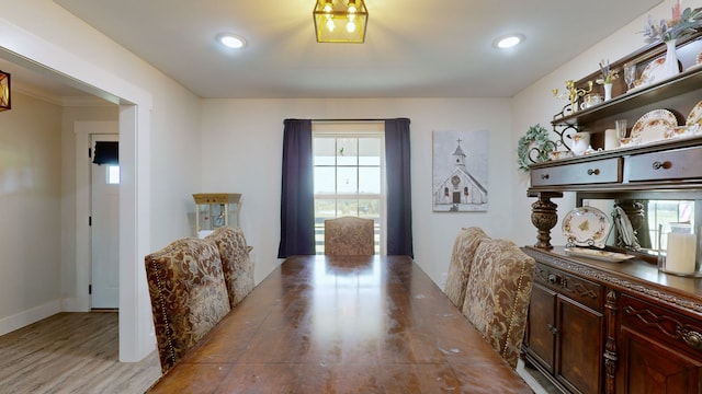 dining room with hardwood / wood-style flooring