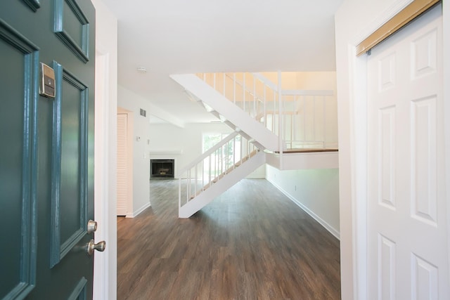 foyer featuring dark hardwood / wood-style floors