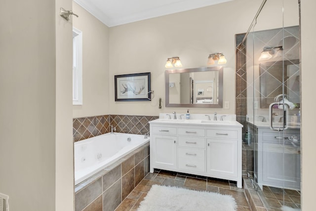 bathroom with vanity, ornamental molding, and shower with separate bathtub