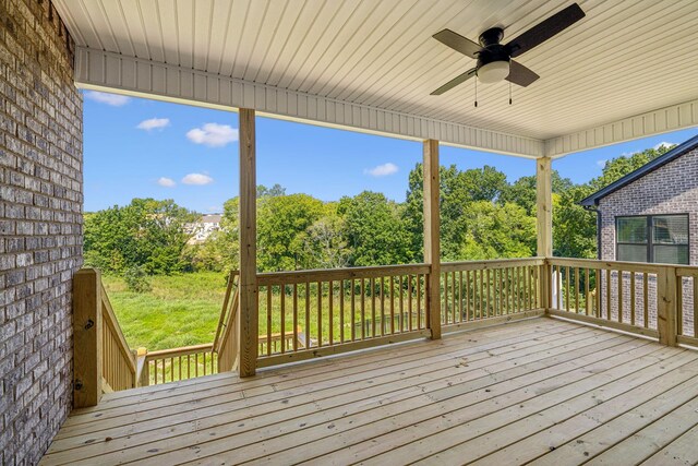 wooden terrace with ceiling fan