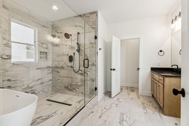 bathroom featuring vanity, plus walk in shower, and tile patterned floors