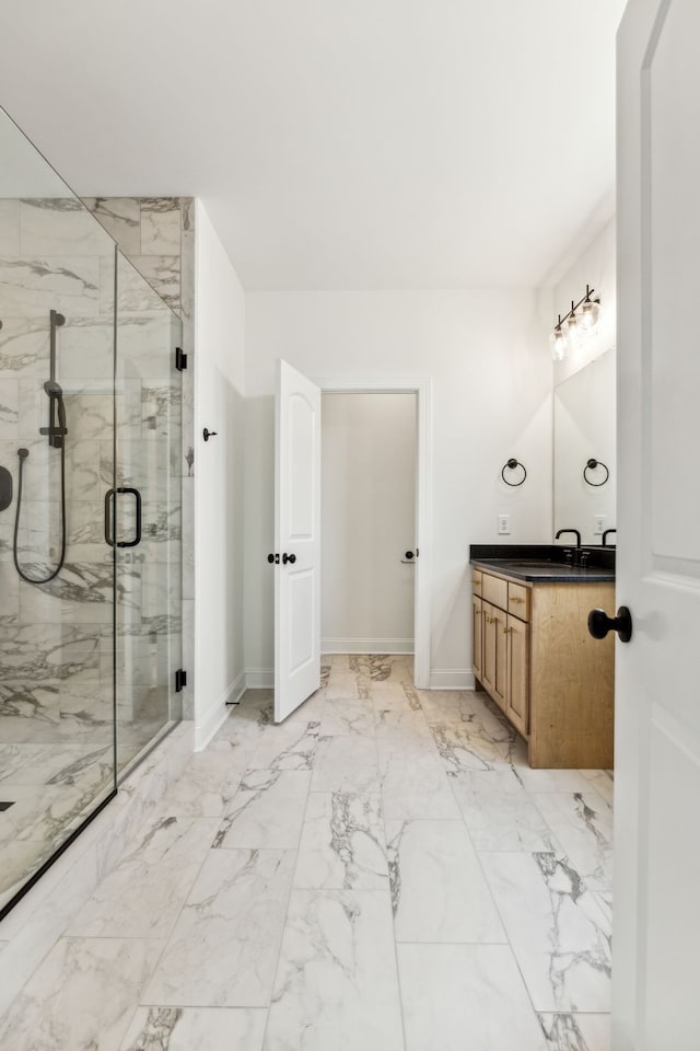 bathroom featuring vanity, an enclosed shower, and tile patterned flooring