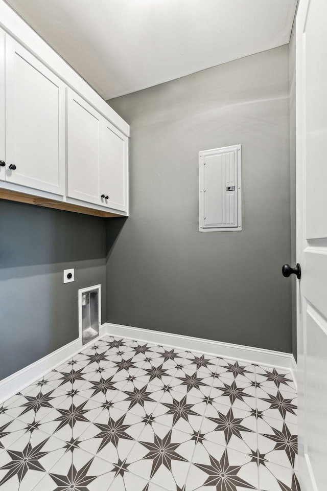 laundry room with baseboards, cabinet space, tile patterned floors, electric panel, and electric dryer hookup