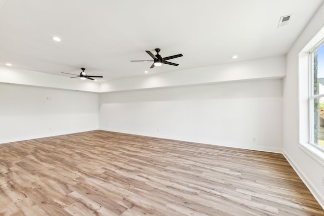 spare room featuring recessed lighting, visible vents, and light wood-style flooring