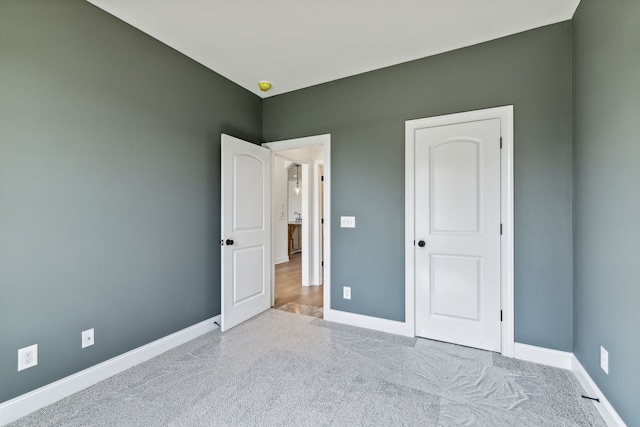 unfurnished bedroom featuring carpet floors