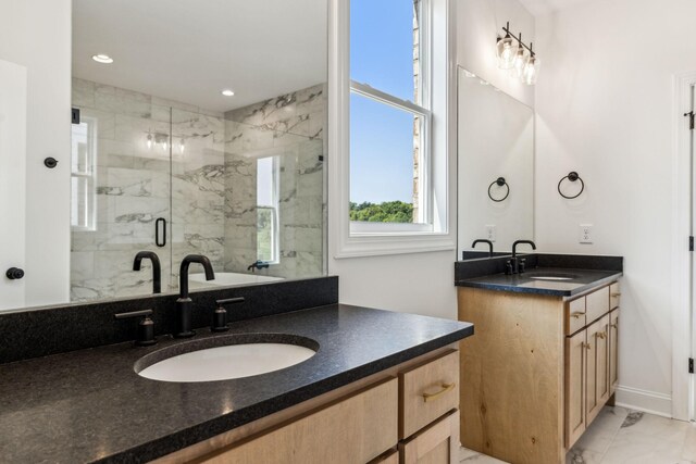 bathroom featuring dual vanity, walk in shower, and tile patterned flooring