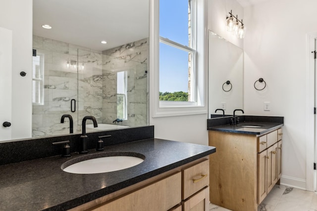 bathroom with a marble finish shower, a sink, marble finish floor, two vanities, and recessed lighting