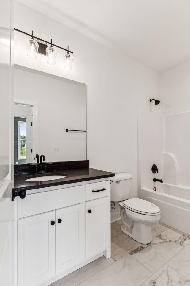 full bathroom with tile patterned floors, shower / bath combination, toilet, and vanity