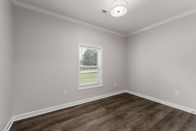 unfurnished room with ornamental molding and dark hardwood / wood-style flooring