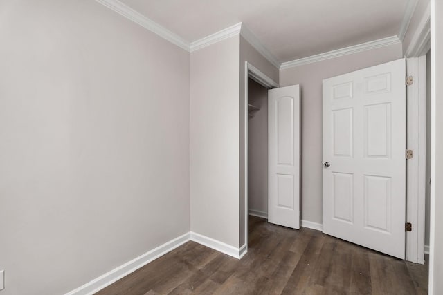 unfurnished bedroom featuring crown molding and dark wood-type flooring