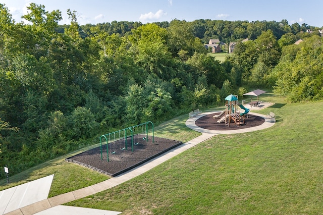 view of community with a playground and a lawn