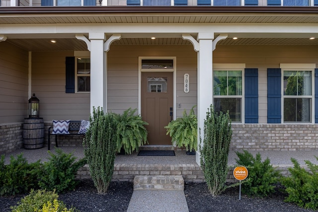 entrance to property with covered porch