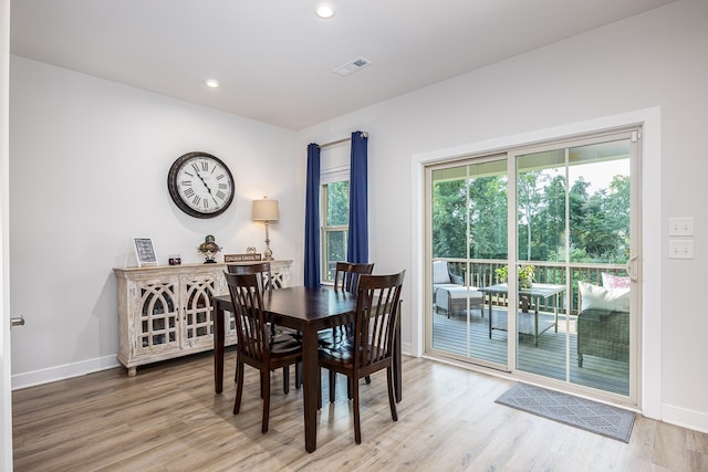 dining room featuring light hardwood / wood-style flooring