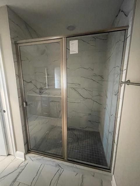 bathroom with an enclosed shower