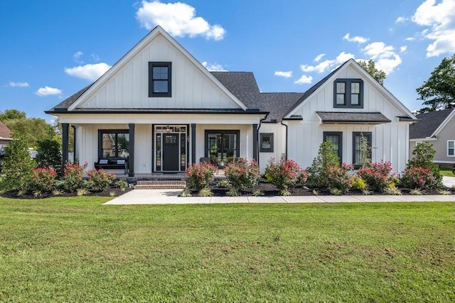 view of front facade with a porch and a front yard