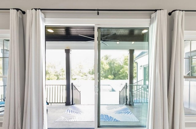 doorway to outside featuring a wealth of natural light