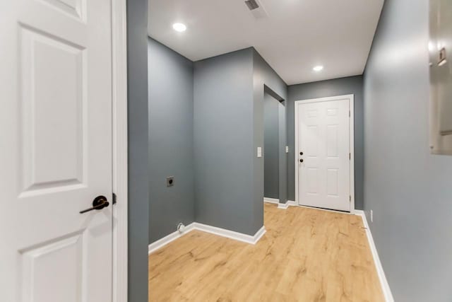 doorway to outside with hardwood / wood-style flooring