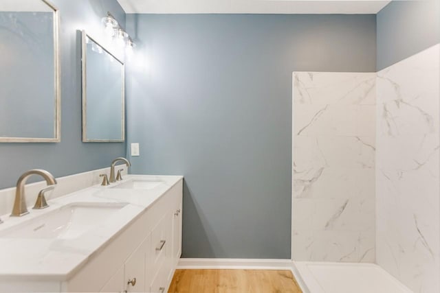 bathroom featuring wood-type flooring and vanity