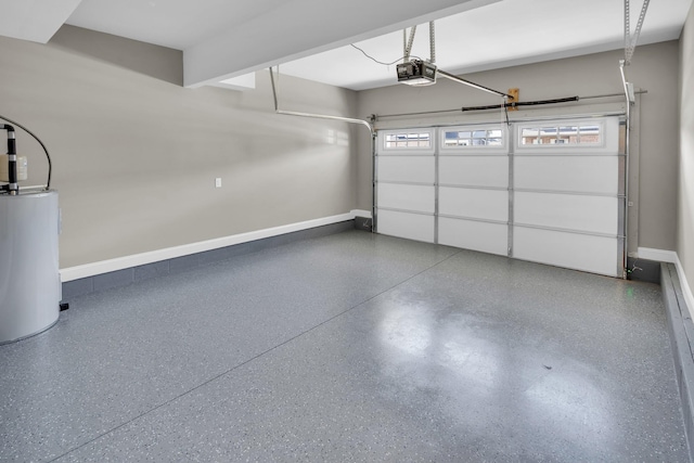 garage with baseboards, gas water heater, and a garage door opener