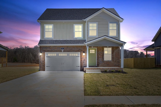 traditional-style home featuring concrete driveway, an attached garage, fence, board and batten siding, and brick siding