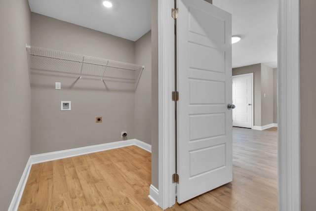 laundry area with hookup for a washing machine, laundry area, baseboards, light wood-style floors, and electric dryer hookup