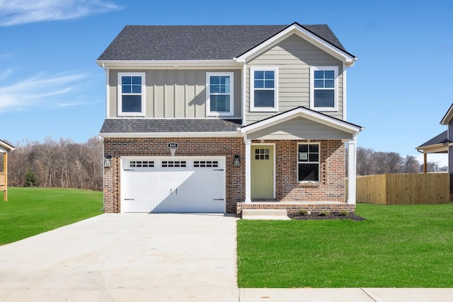 traditional-style house with brick siding, board and batten siding, a front lawn, and fence