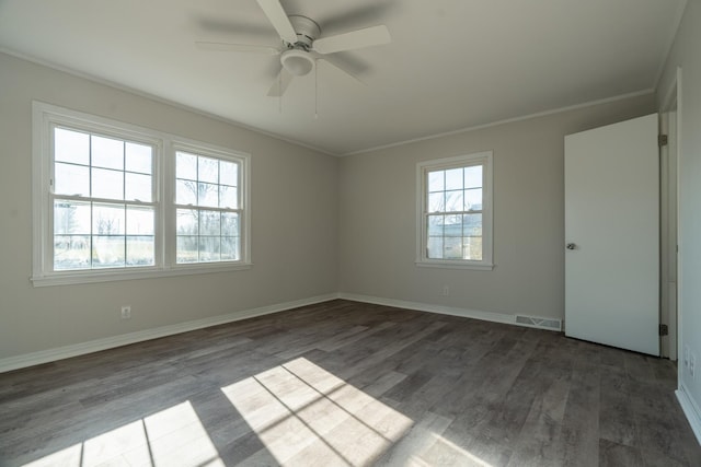 spare room with crown molding, hardwood / wood-style floors, and ceiling fan