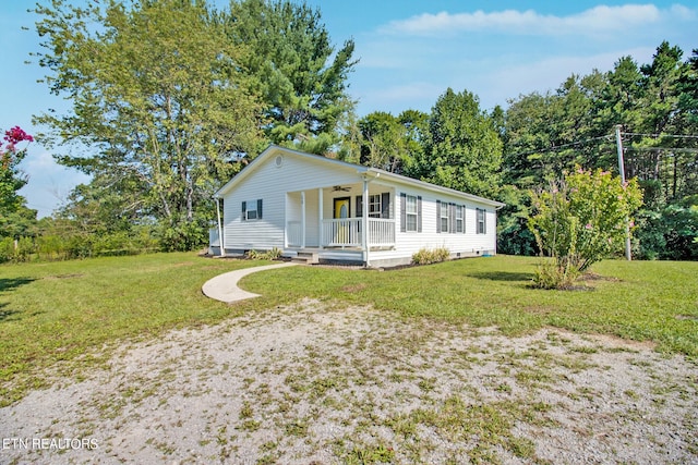 single story home featuring a front lawn and covered porch