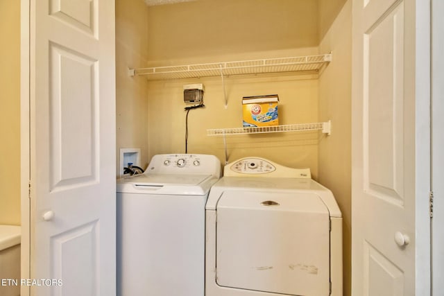 laundry area featuring independent washer and dryer