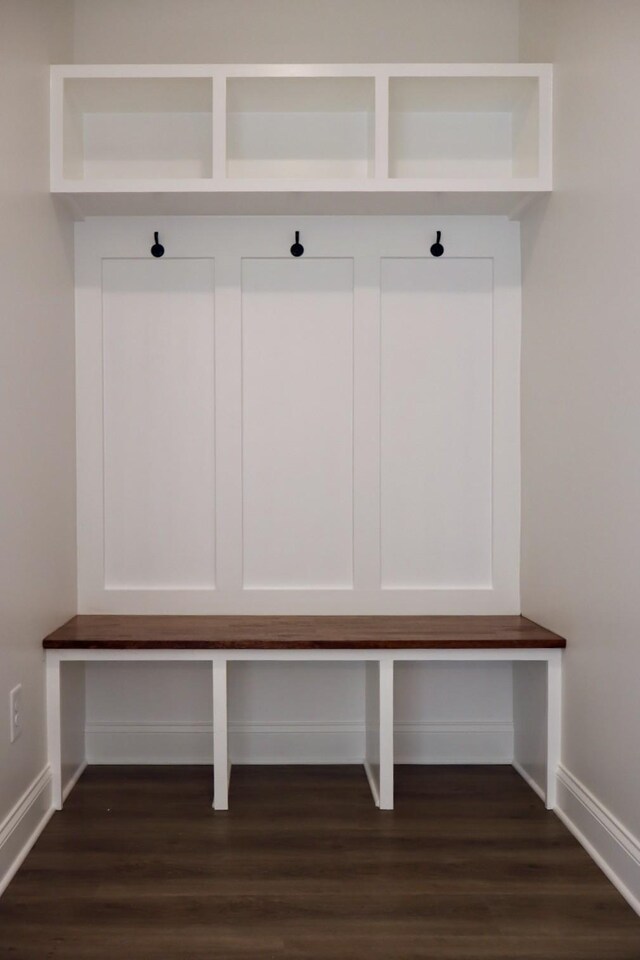 mudroom with dark hardwood / wood-style floors