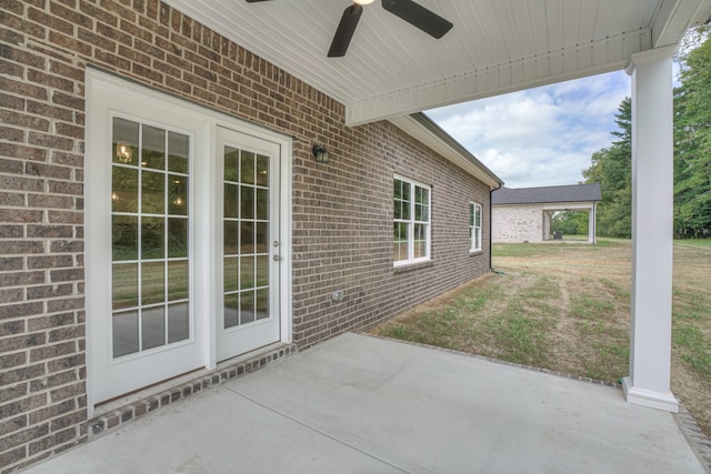 view of patio featuring ceiling fan