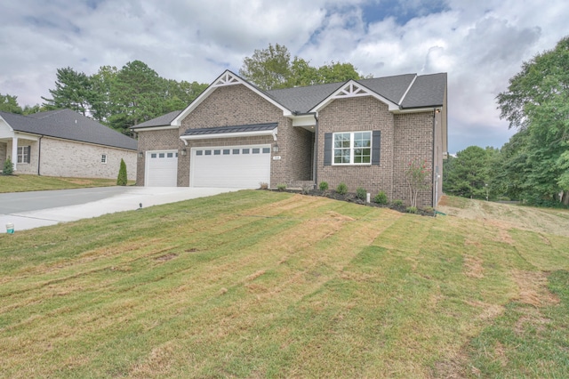 view of front facade with a garage and a front yard