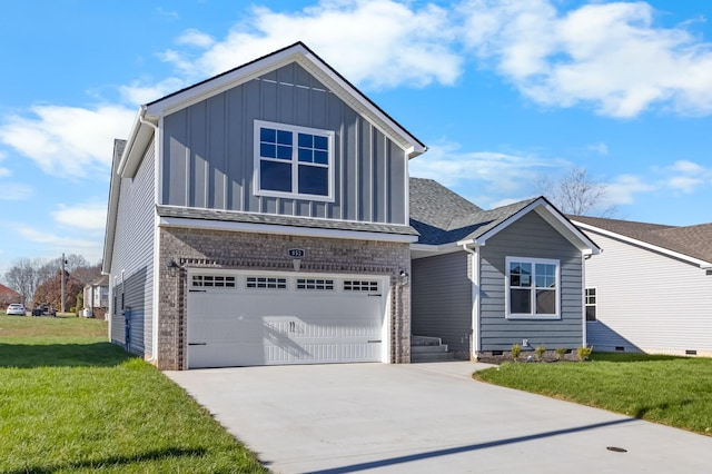 view of front facade with a front lawn and a garage