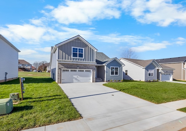 view of front facade with a front lawn and a garage