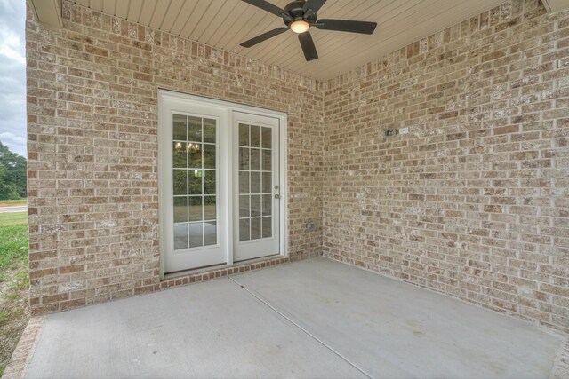 view of patio featuring ceiling fan