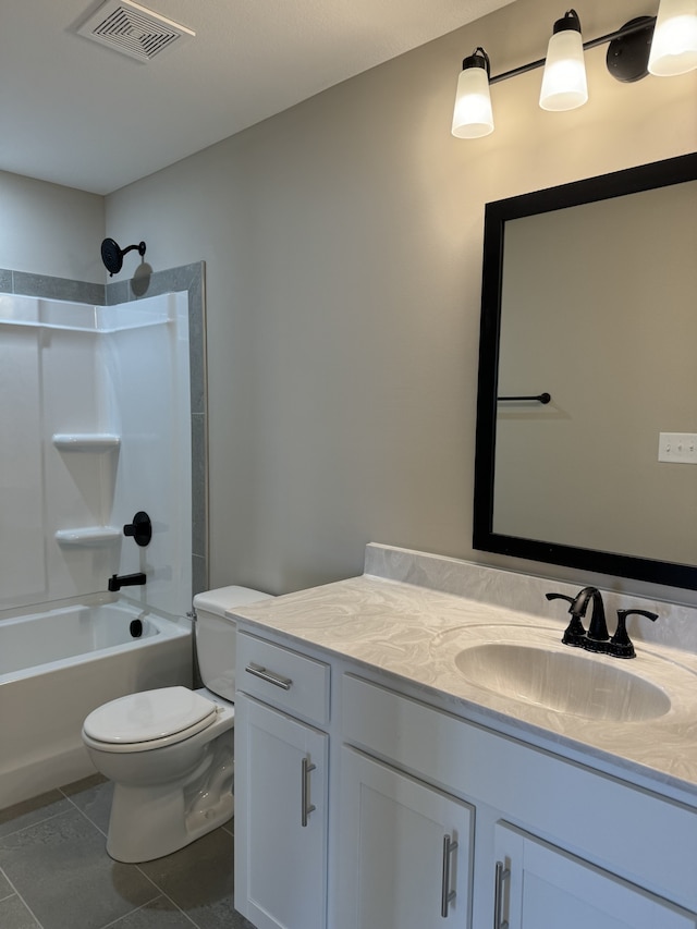 full bathroom with shower / tub combination, vanity, tile patterned floors, and toilet