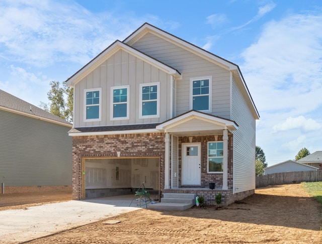 craftsman house with a garage