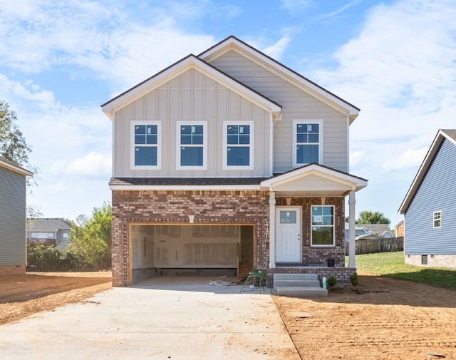 craftsman house with a garage