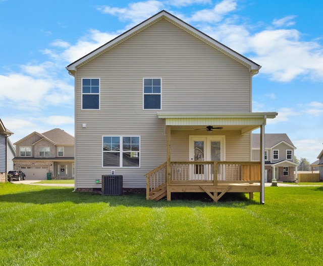 138 Anderson Pl, Clarksville, TN 37042 - rear view of property with central air condition unit, a ceiling fan, a lawn, and a deck