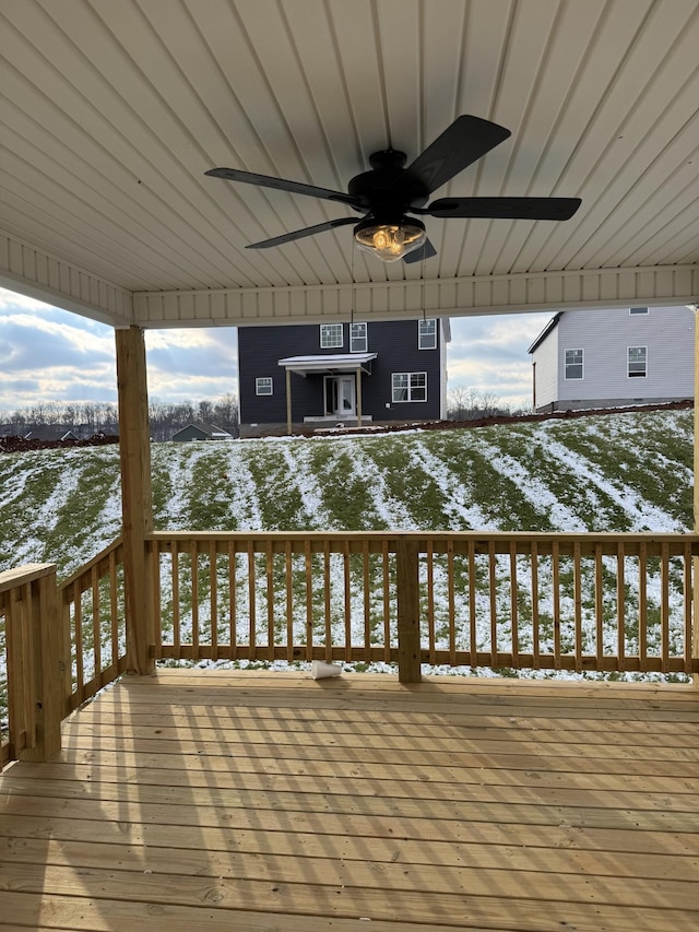 view of snow covered deck