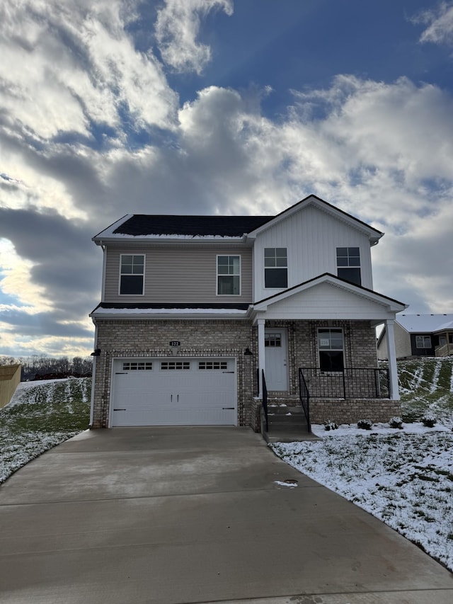 view of front of home with a garage